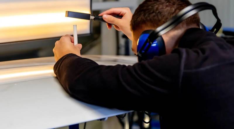 Technicien PdrX-Center pratiquant le DSP sur un véhicule